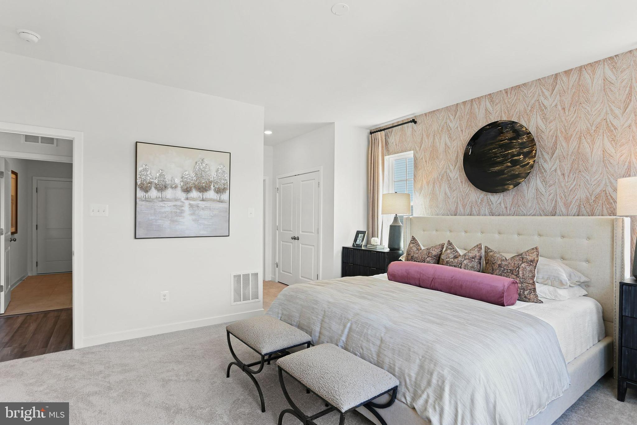 400 Silver Birch Drive Ranson, WV 25438 - Photo 10 of 15 a bedroom with a bed and a painting on the wall