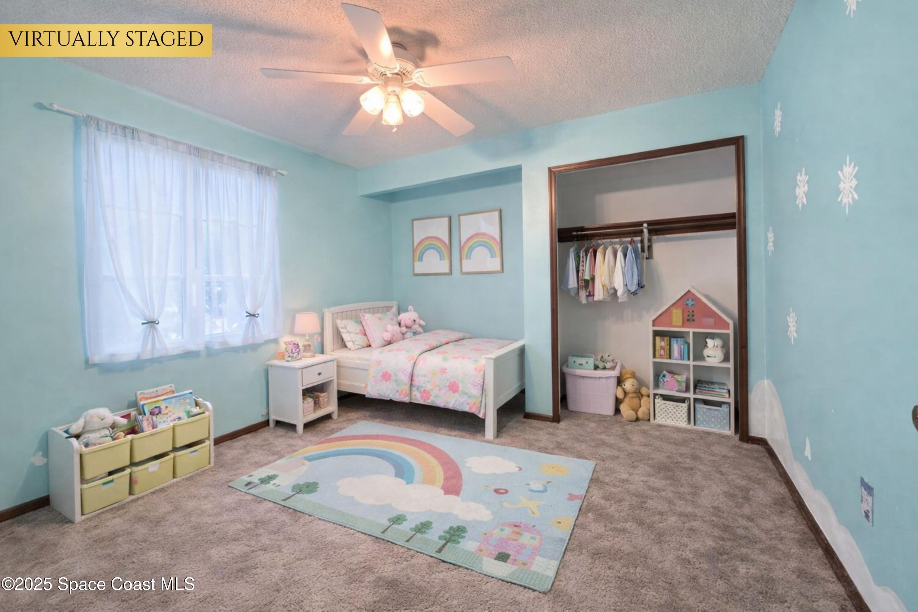 6180 Balboa Street Cocoa, FL 32927 - Photo 24 of 44 a bedroom with a bed and a chandelier