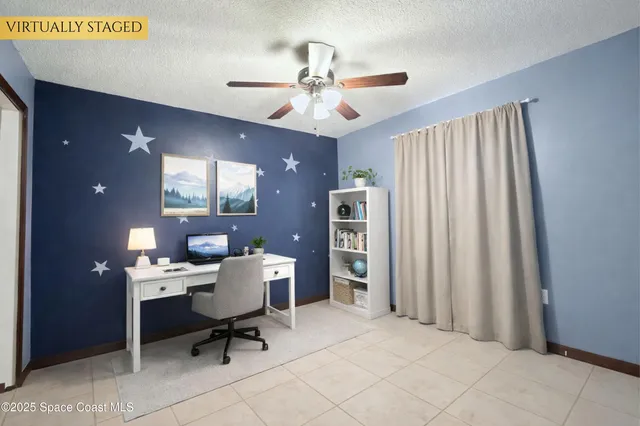 a workspace with furniture and window