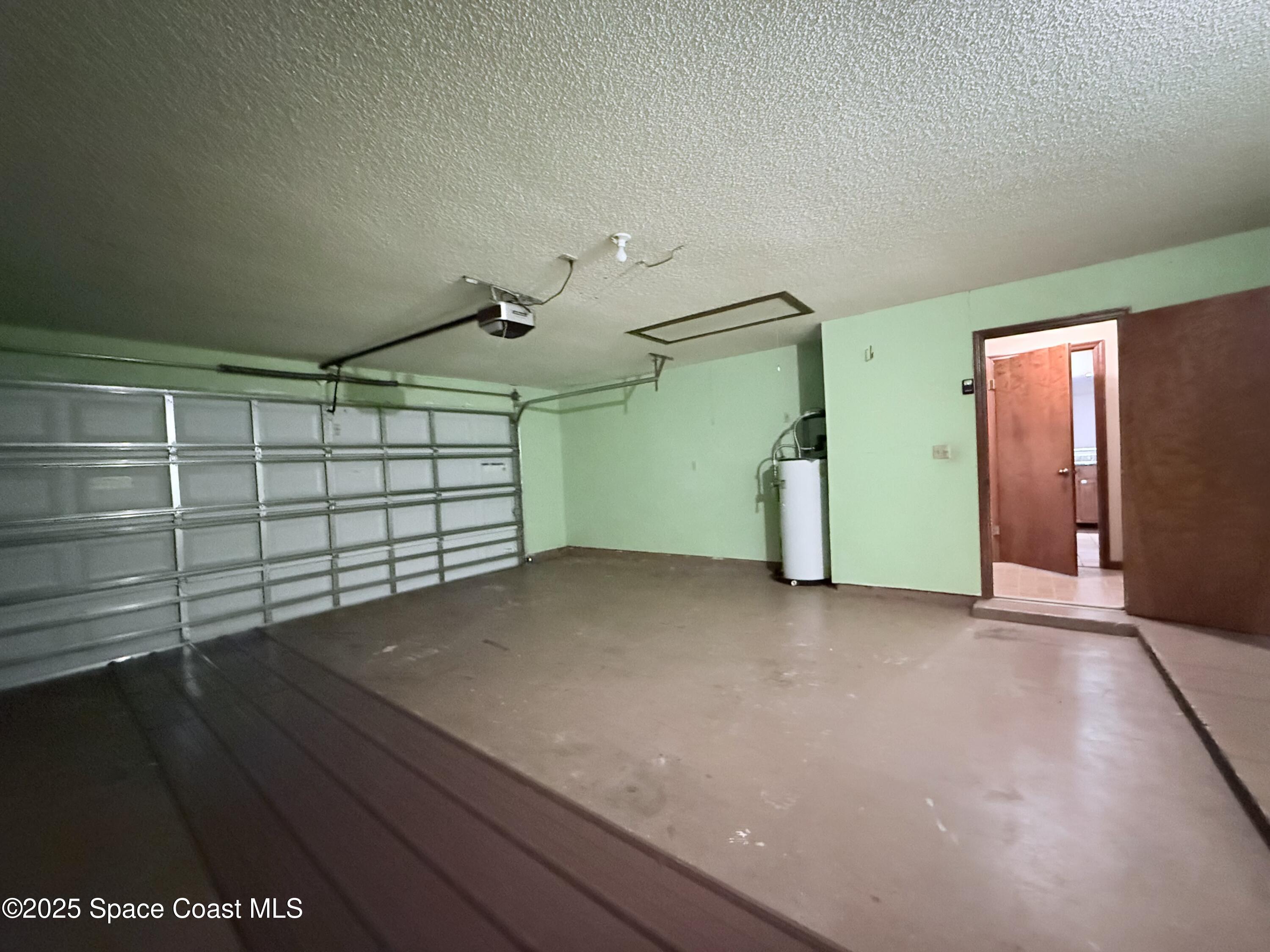 6180 Balboa Street Cocoa, FL 32927 - Photo 31 of 44 a view of a garage