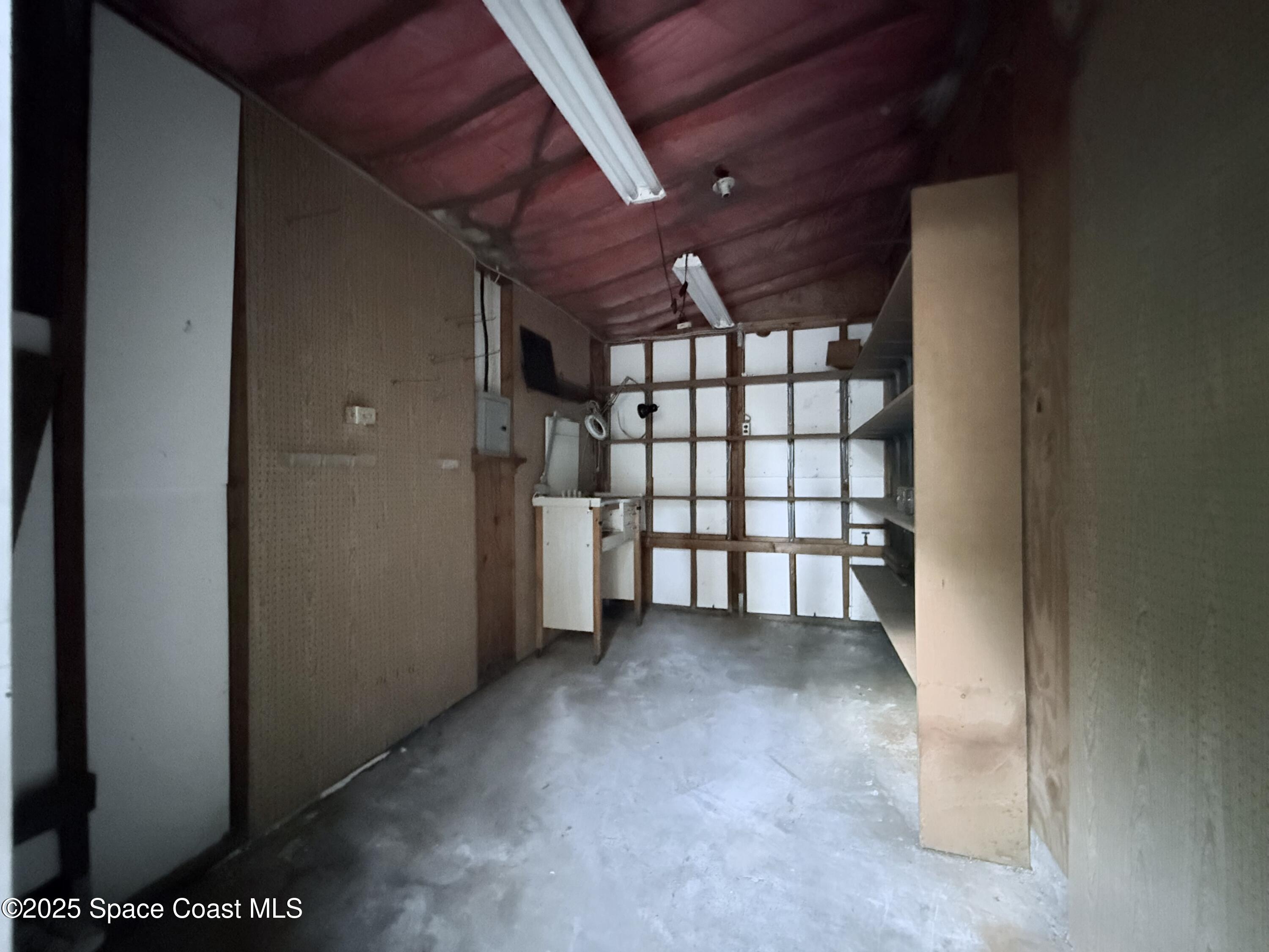 6180 Balboa Street Cocoa, FL 32927 - Photo 39 of 44 a view of a garage