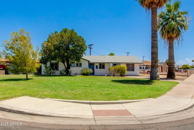 a view of a house with a garden
