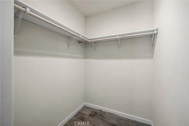 a view of an empty walk in closet