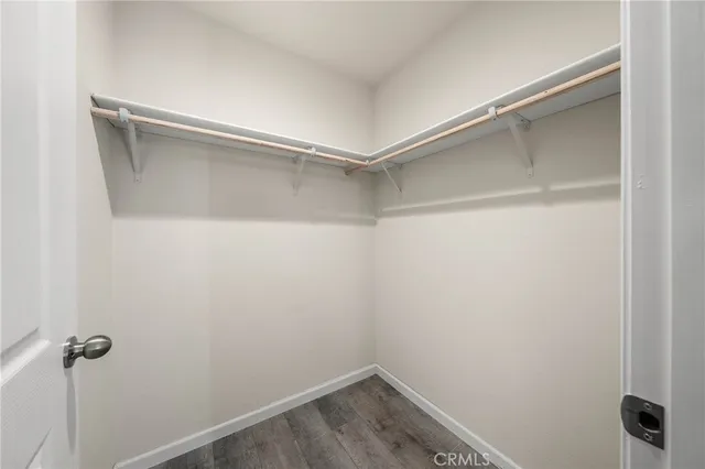 a view of a room with shelf on the wall