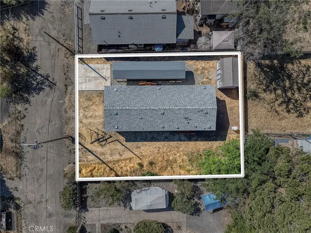 an aerial view of residential house with wooden stairs