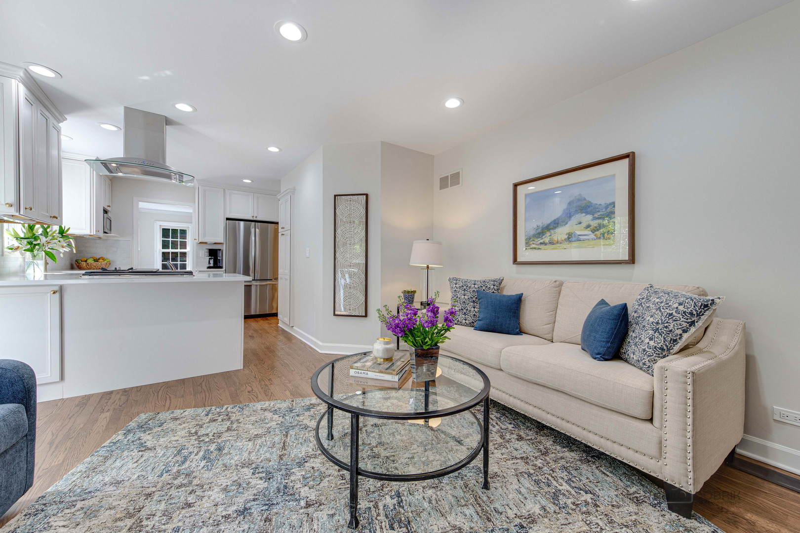 801 Hibbard Road Wilmette, IL 60091 - Photo 14 of 28 a living room with furniture and kitchen view