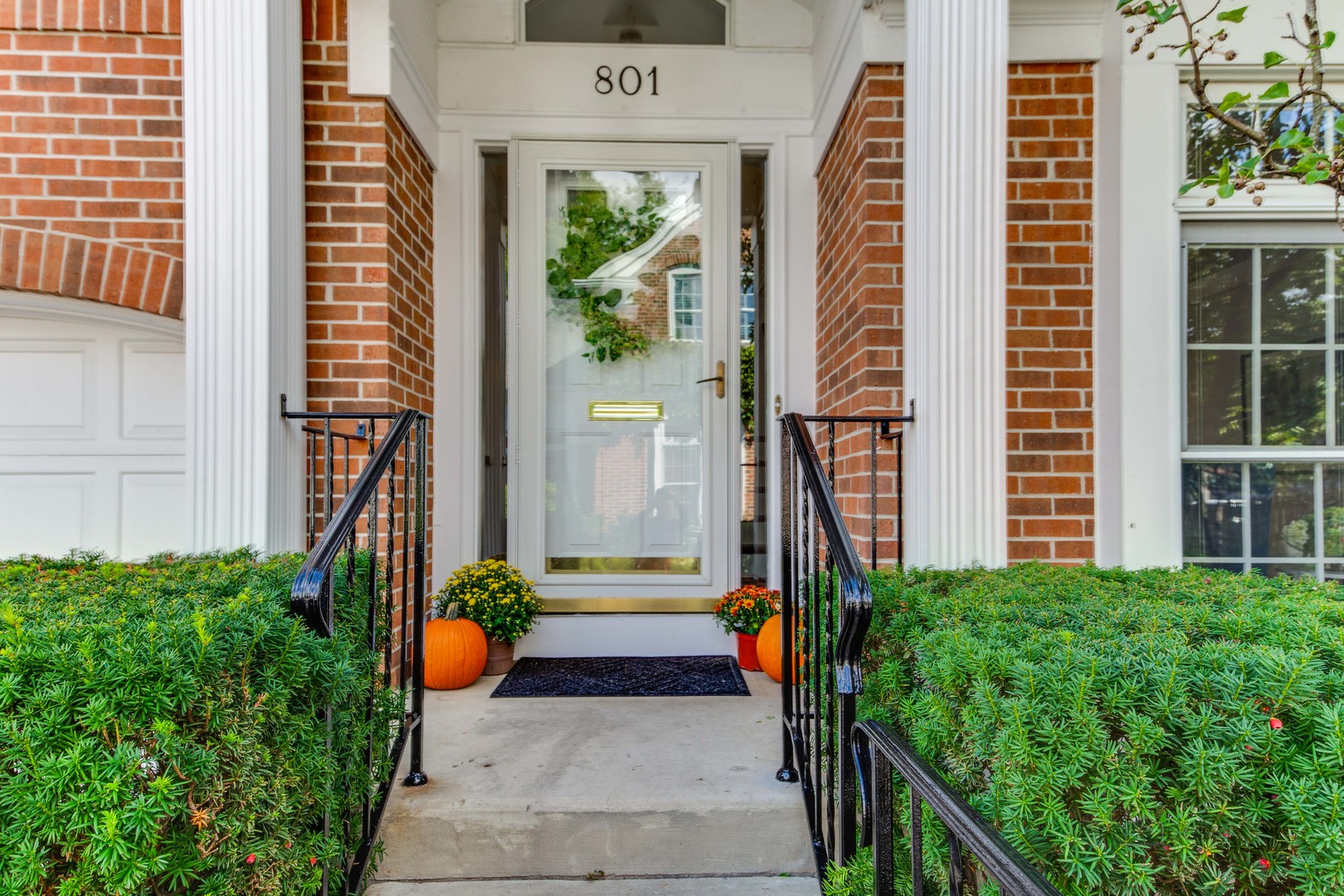 801 Hibbard Road Wilmette, IL 60091 - Photo 2 of 28 a front view of a house with a yard