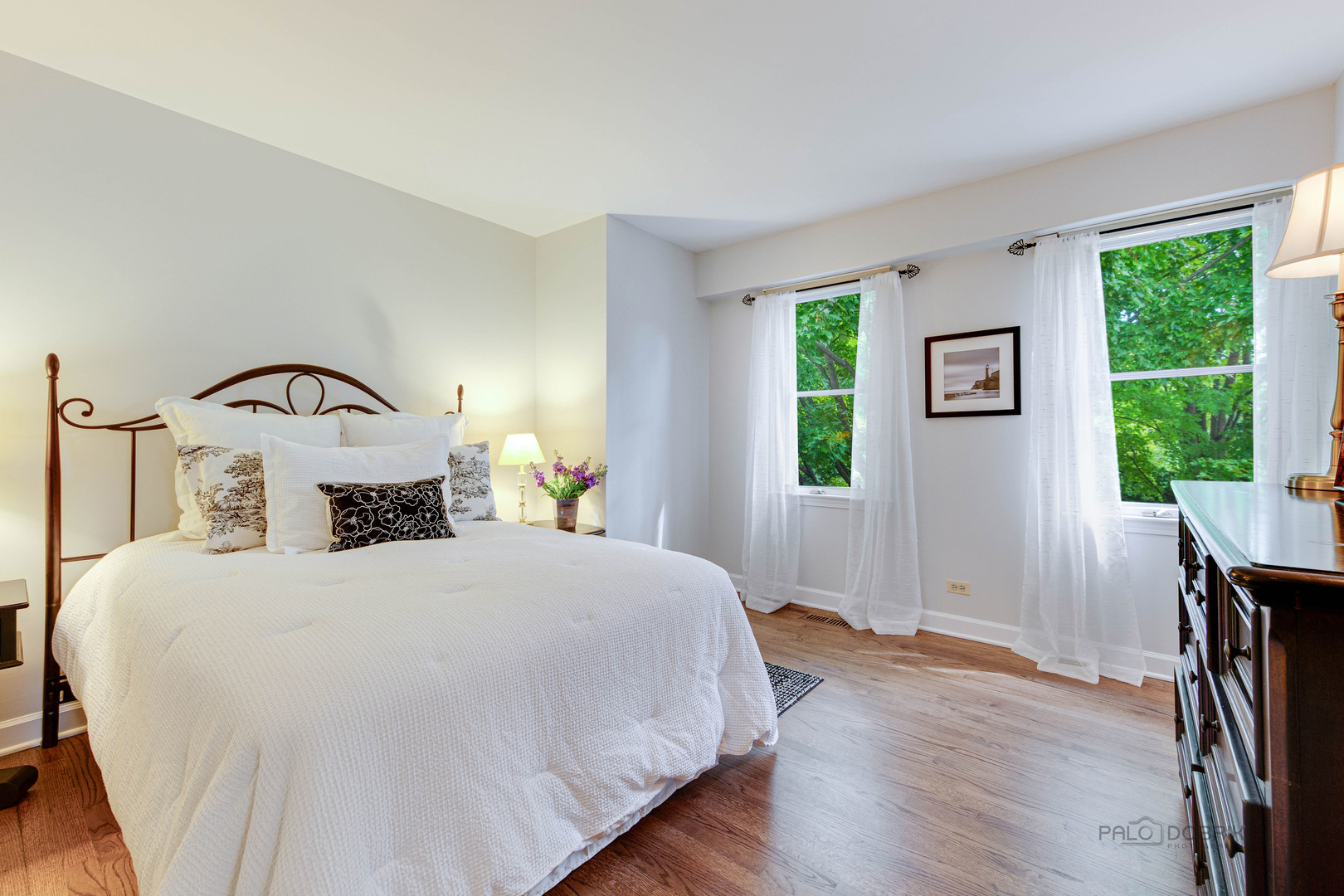 801 Hibbard Road Wilmette, IL 60091 - Photo 21 of 28 a bedroom with a bed and a window
