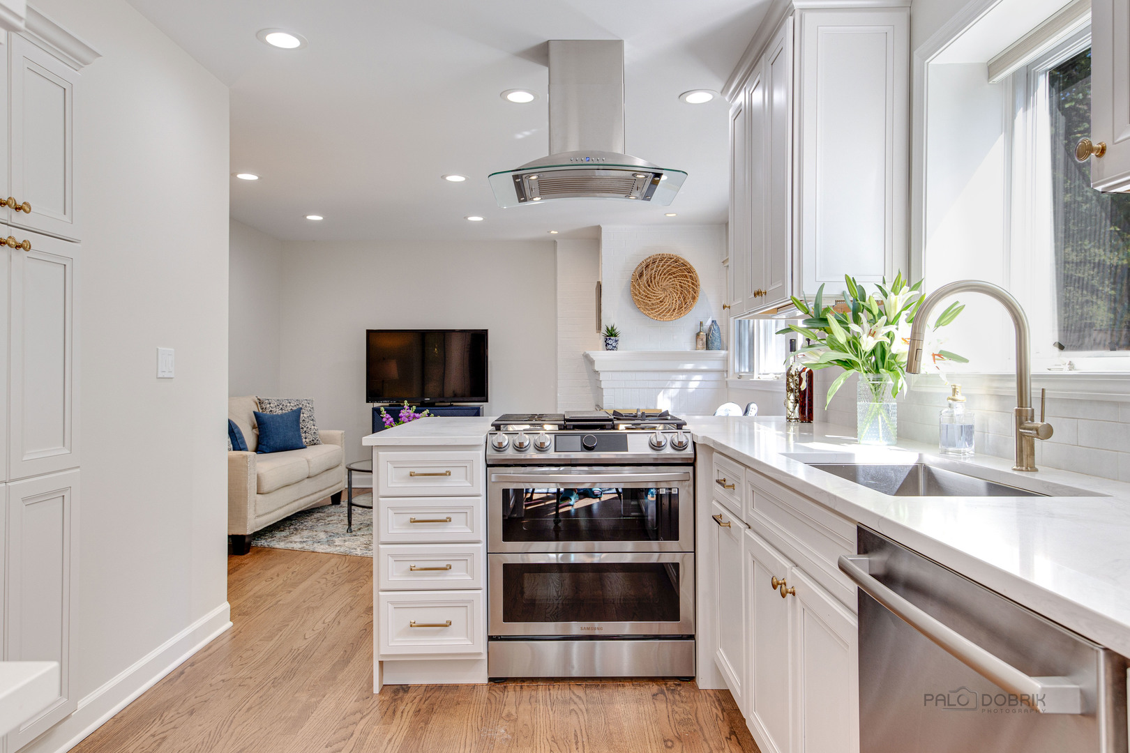 801 Hibbard Road Wilmette, IL 60091 - Photo 7 of 28 a kitchen with a stove and a white wooden floor