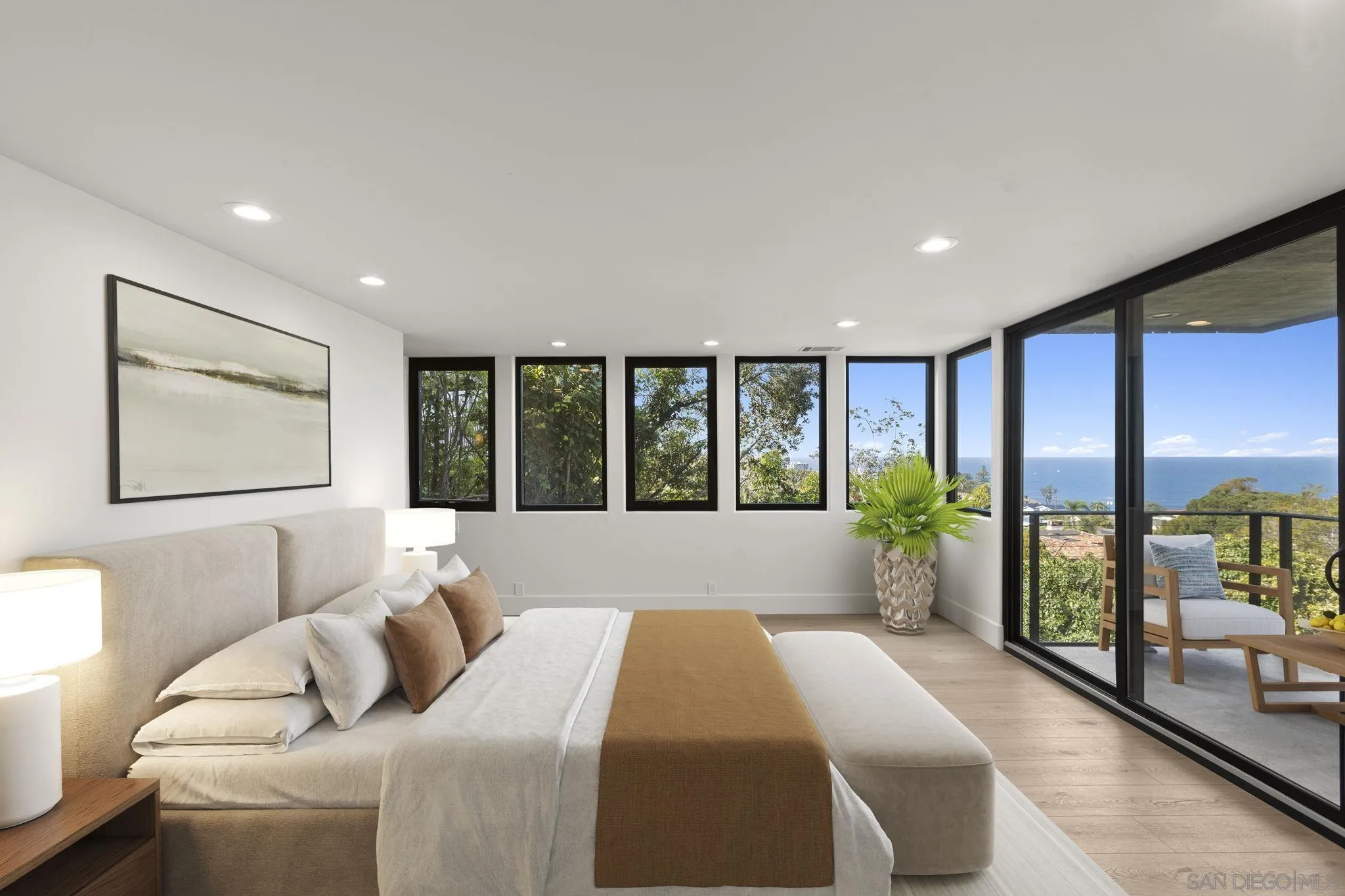 1846 Castellana Road La Jolla, CA 92037 - Photo 16 of 30 a large bedroom with a large bed and a large window