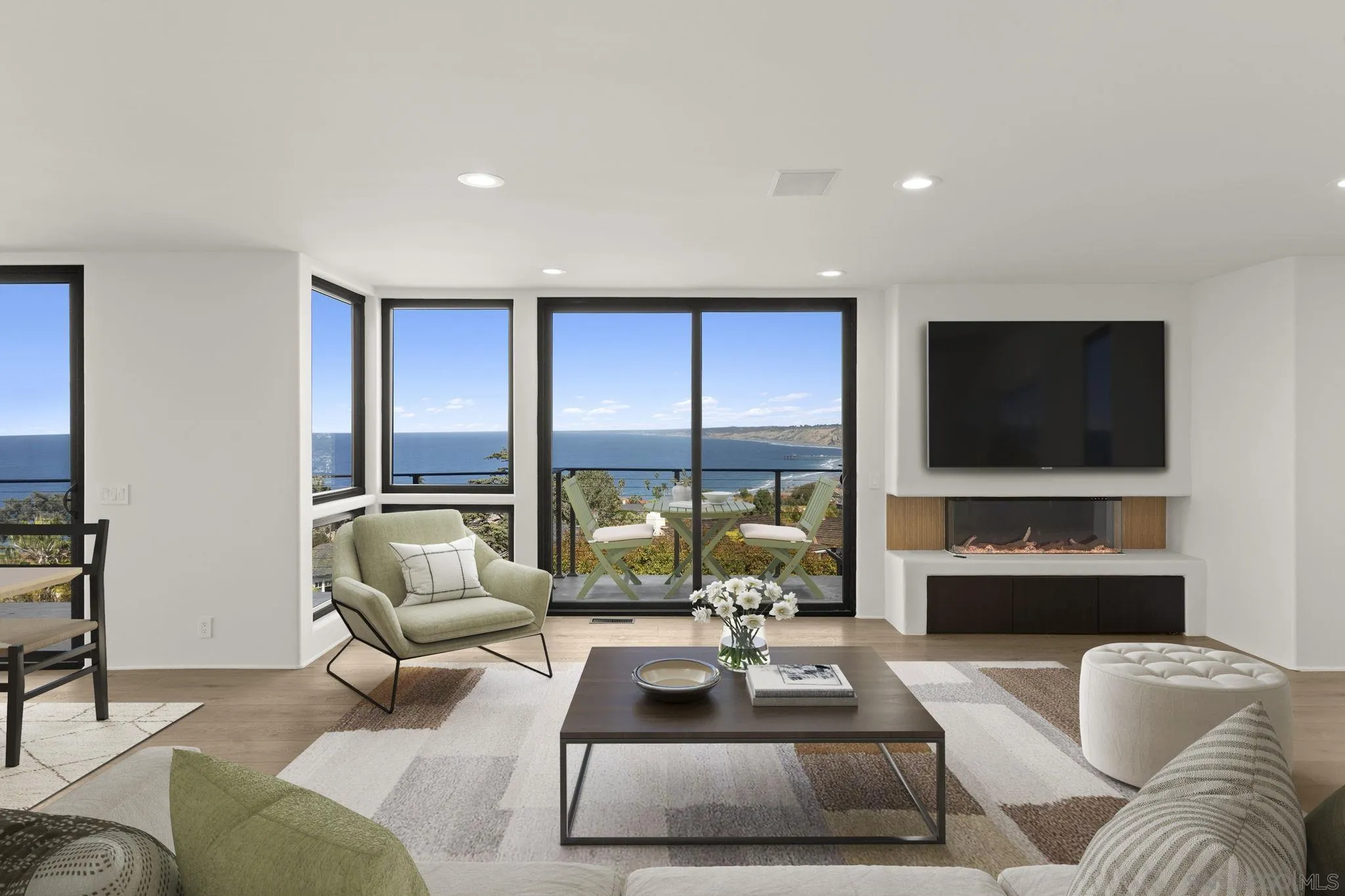 1846 Castellana Road La Jolla, CA 92037 - Photo 2 of 30 a living room with furniture and a flat screen tv