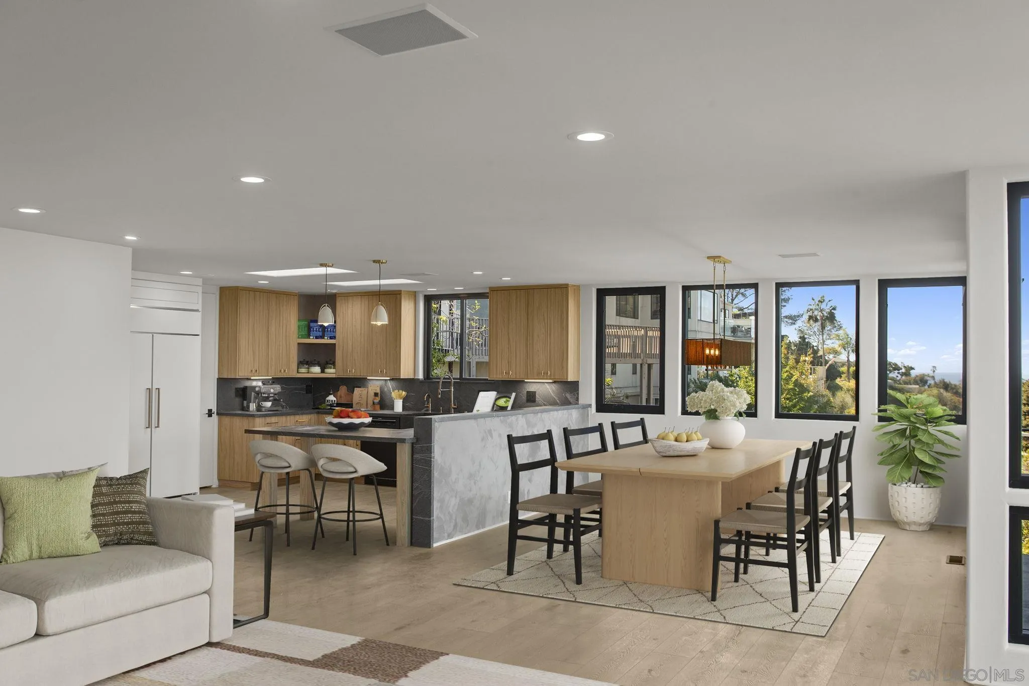 1846 Castellana Road La Jolla, CA 92037 - Photo 6 of 30 a view of a dining room with furniture and chandelier