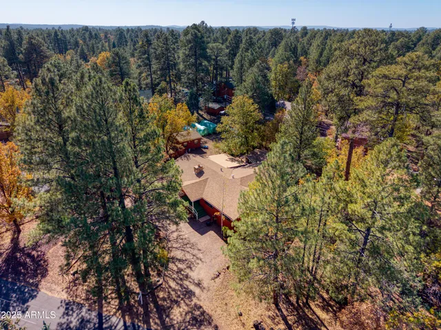 an aerial view of residential house with outdoor space