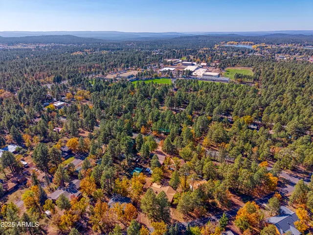 an aerial view of a city with lots of residential buildings
