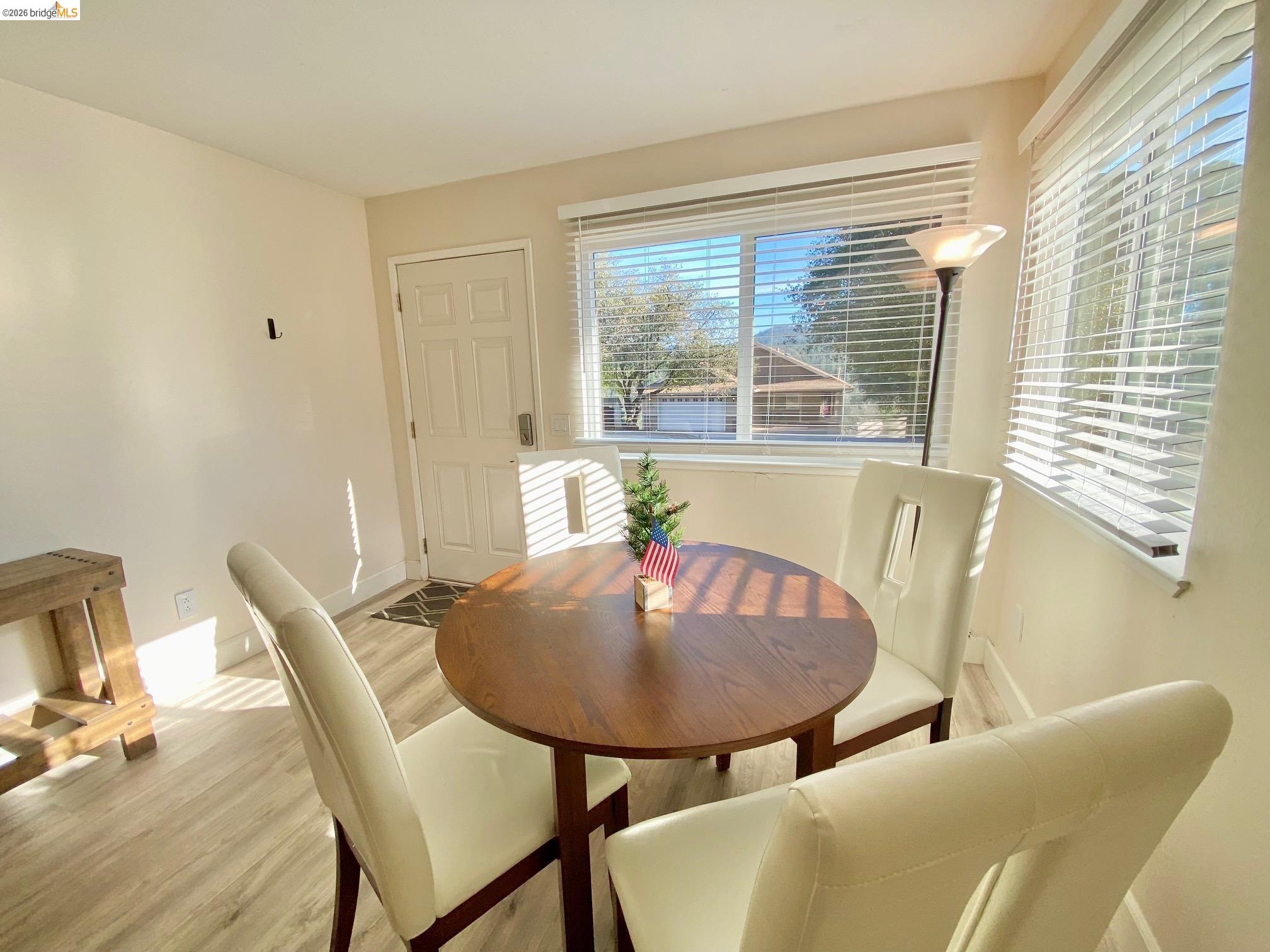 19096 Dyer Court, Unit 2 Groveland, CA 95321 - Photo 12 of 46 a dining room with furniture and window