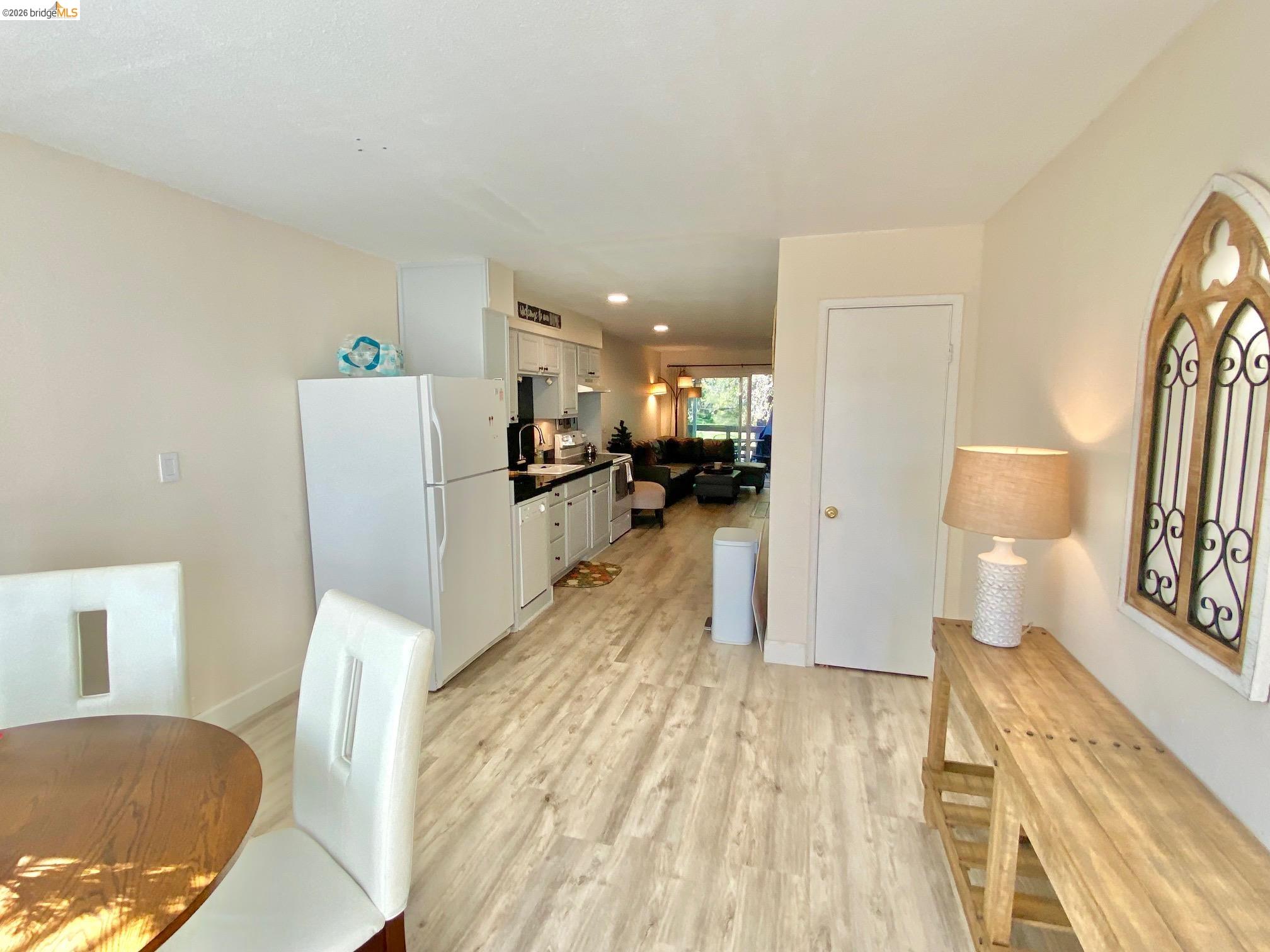 19096 Dyer Court, Unit 2 Groveland, CA 95321 - Photo 13 of 46 a living room with furniture and a wooden floor