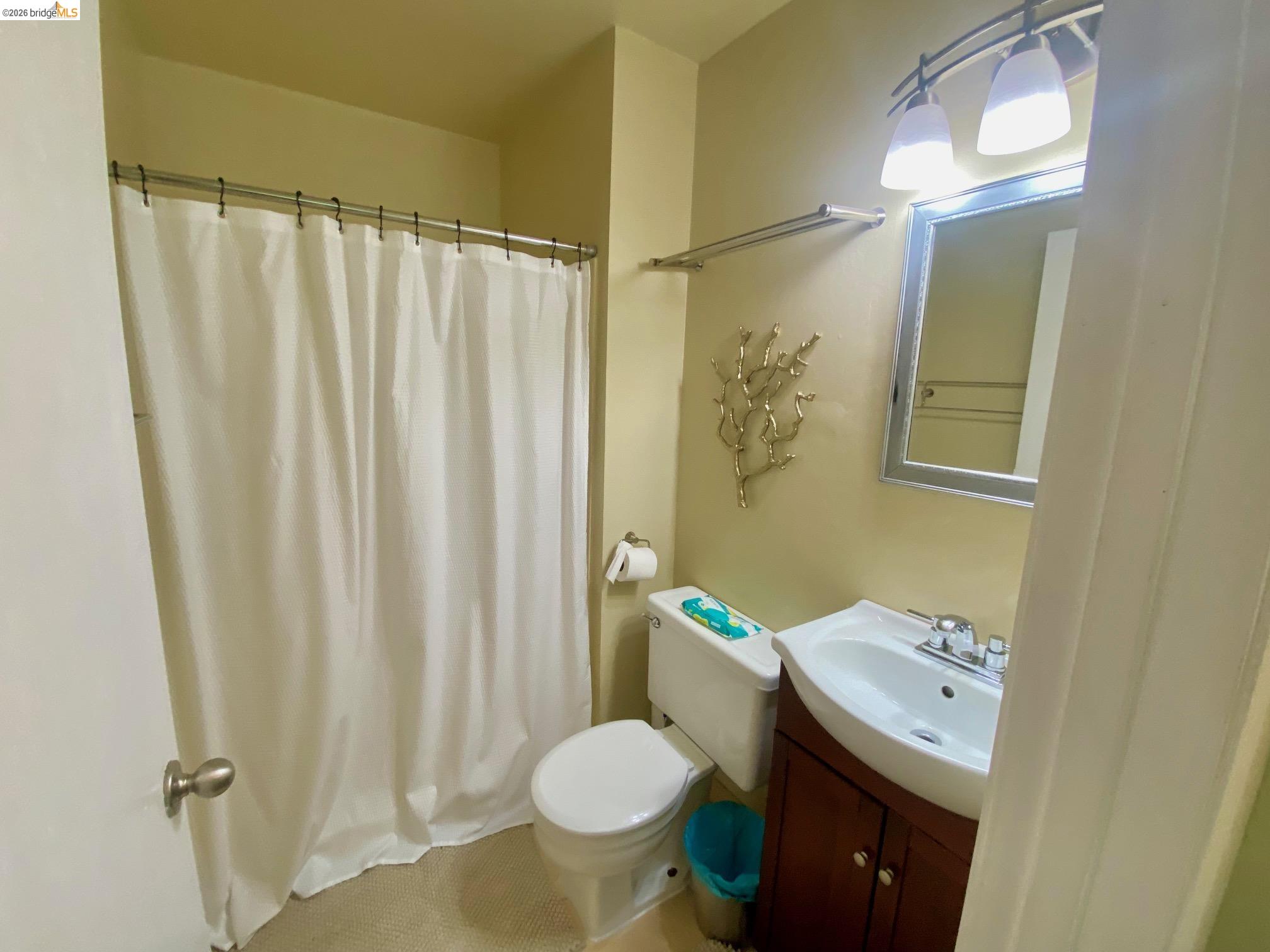 19096 Dyer Court, Unit 2 Groveland, CA 95321 - Photo 21 of 46 a bathroom with a sink toilet and shower