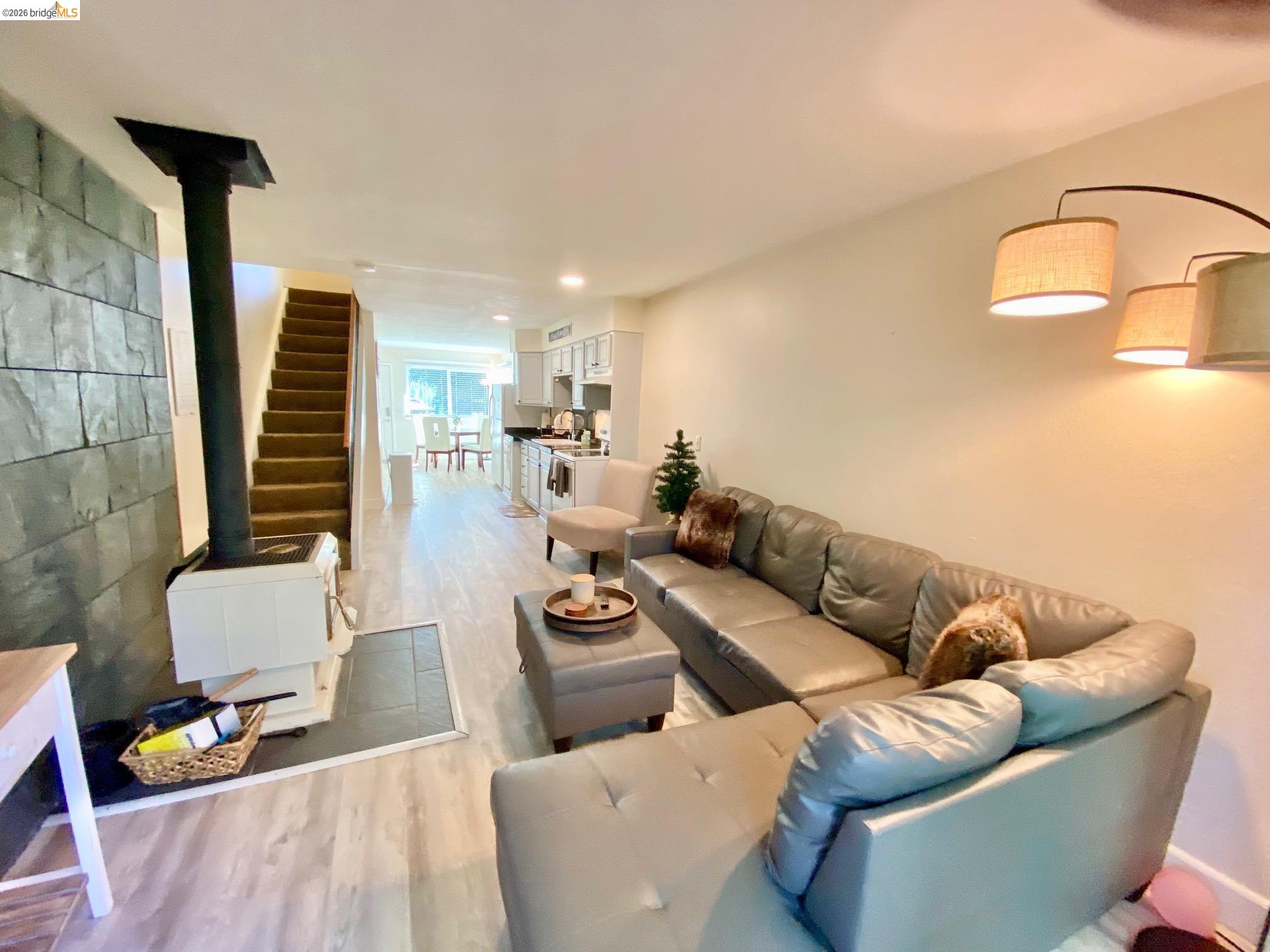 19096 Dyer Court, Unit 2 Groveland, CA 95321 - Photo 6 of 46 a living room with furniture and wooden floor