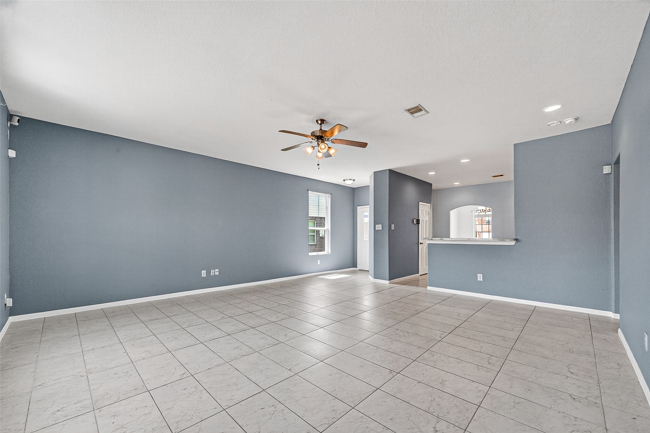 2702 Modano Court Fresno, TX 77545 - Photo 5 of 46 a view of an empty room with a window