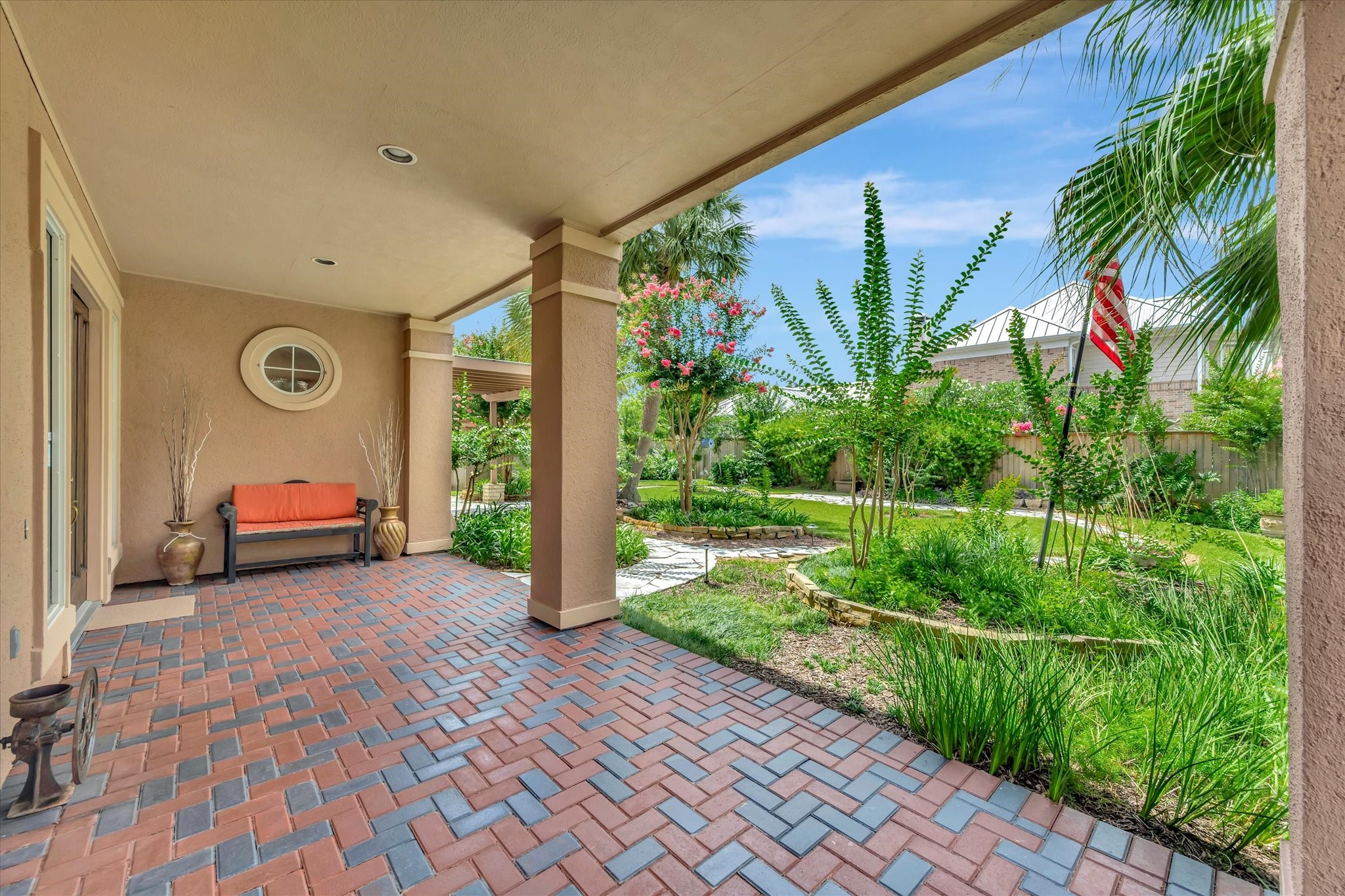 604 Harborside Way Kemah, TX 77565 - Photo 10 of 46 BEAUTIFUL COURTYARD DESIGN COMBINE INTERIOR LIVING SPACES WITH THE OVERSIZED YARD AND GARDENS.