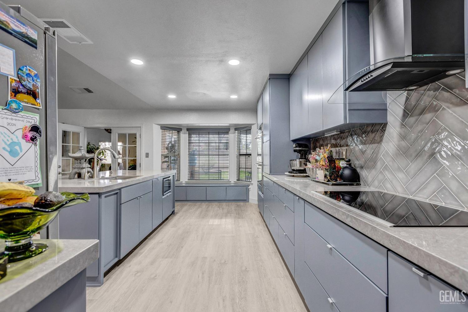 Undisclosed Address Delano, CA 93215 - Photo 14 of 40 a kitchen with granite countertop lots of counter top space