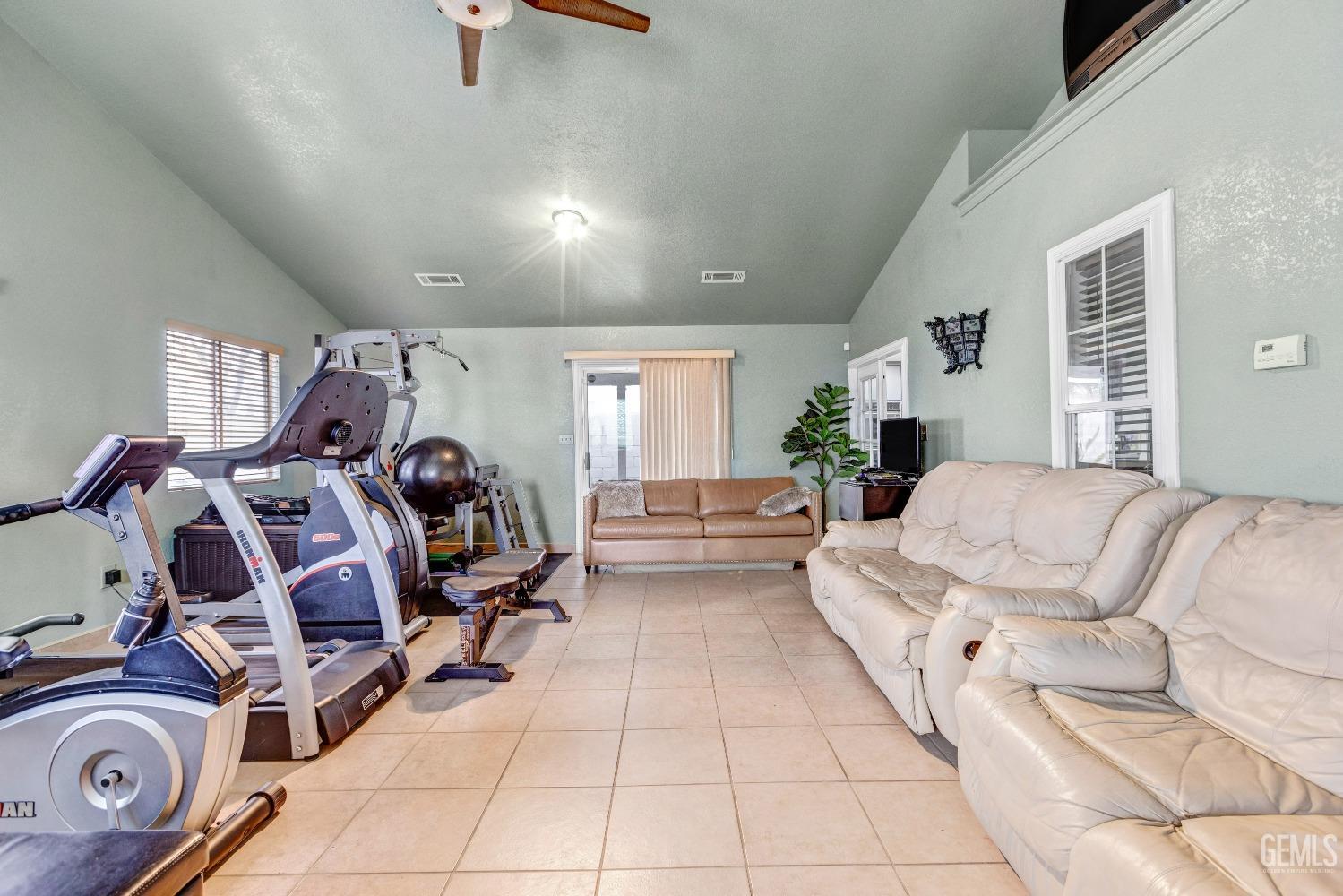 Undisclosed Address Delano, CA 93215 - Photo 19 of 40 a view of a room with gym equipment