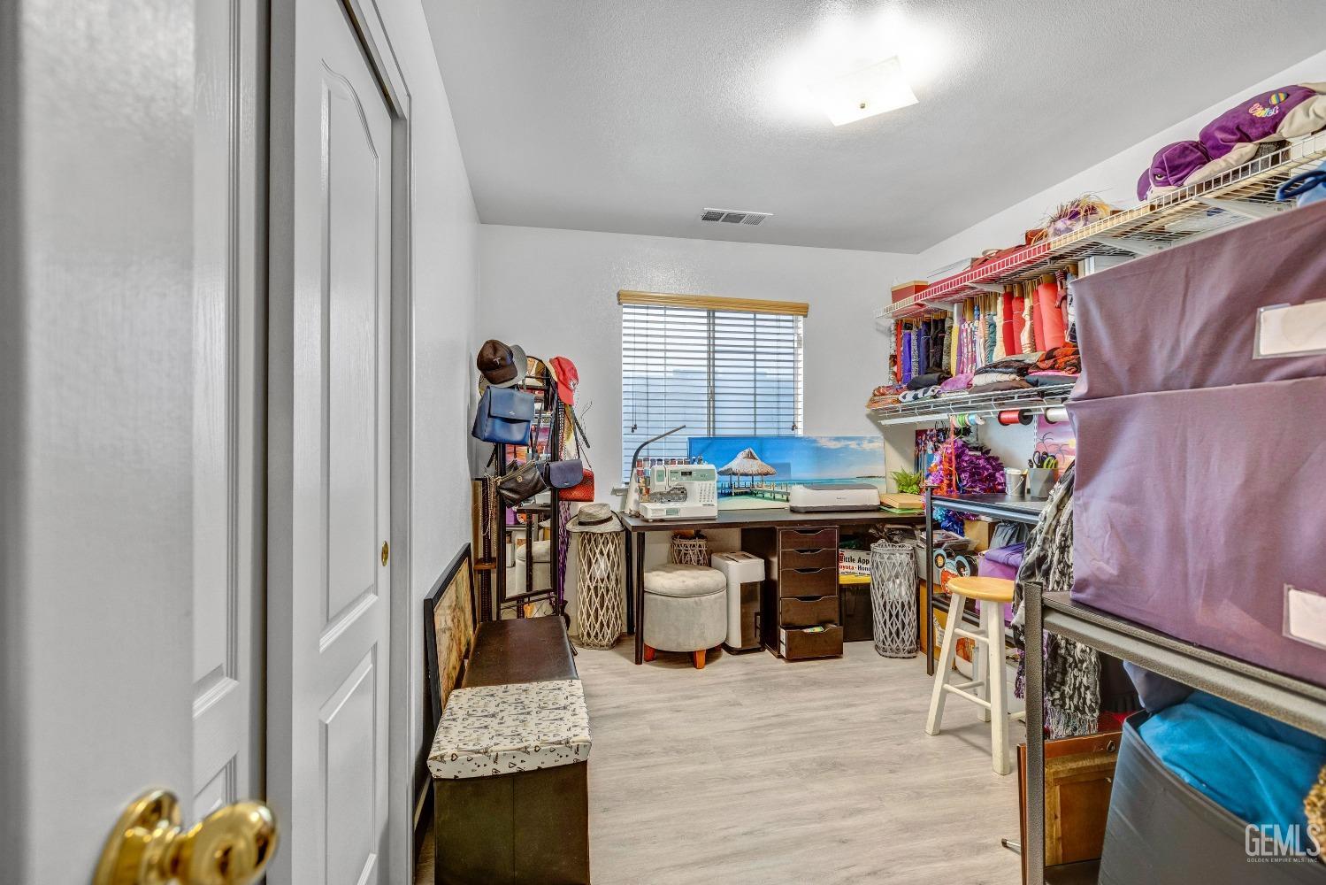 Undisclosed Address Delano, CA 93215 - Photo 29 of 40 a view of entryway with a dining table and chairs
