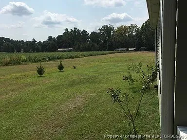 a view of a golf course with a lake