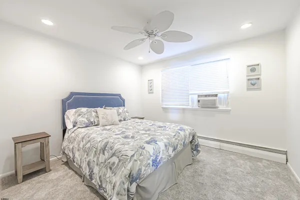 a view of a cars park in front of a building