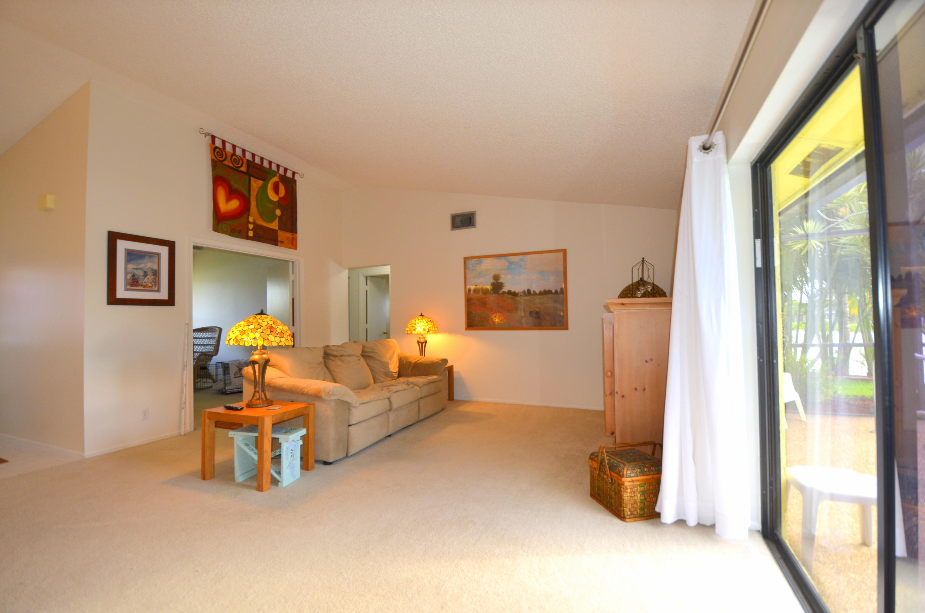 9539 Silverspring Lane Boca Raton, FL 33434 - Photo 10 of 28 a bedroom with furniture and a window