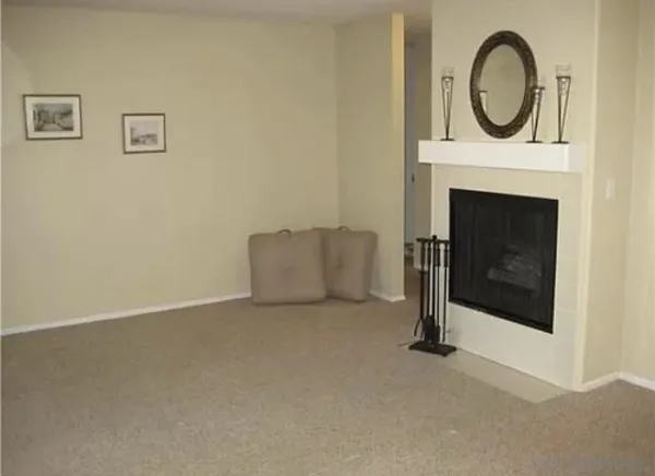 a living room with a fireplace