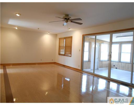 8 Nottingham Road Edison, NJ 08820 - Photo 2 of 15 a view of an empty room with a window
