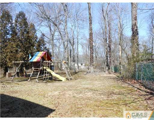 8 Nottingham Road Edison, NJ 08820 - Photo 14 of 15 a view of outdoor space with playground