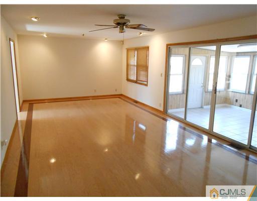 8 Nottingham Road Edison, NJ 08820 - Photo 3 of 15 a view of an empty room