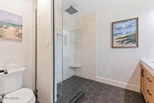 a view of a porch with wooden floor and outdoor seating