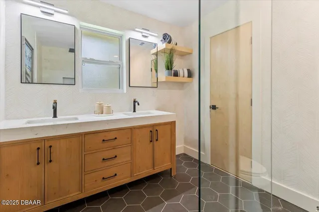 a house view with a sitting space and garden