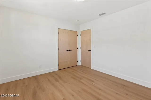 a view of a pathway with a yard