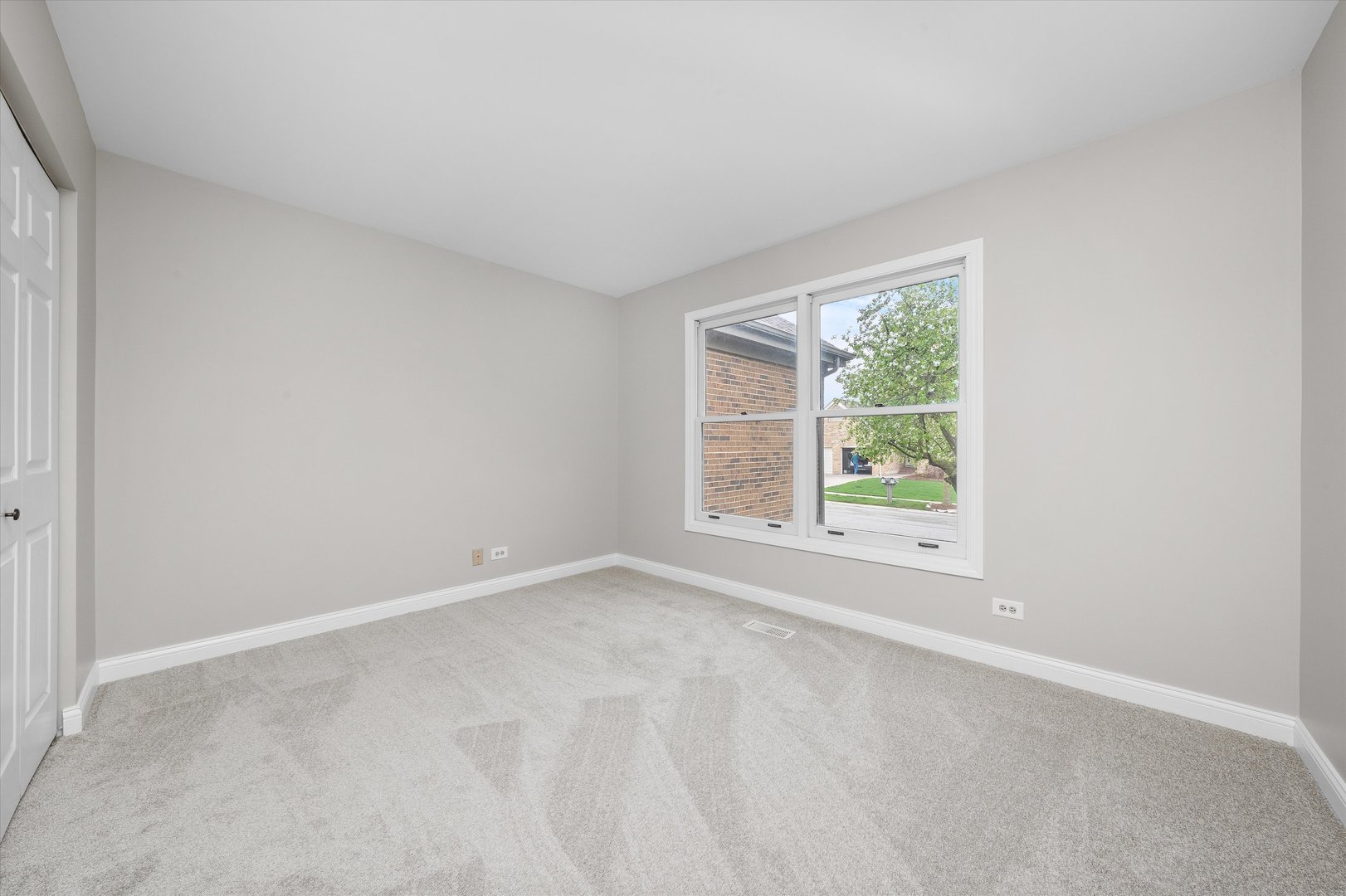 10620 Golf Road Orland Park, IL 60462 - Photo 18 of 42 an empty room with windows