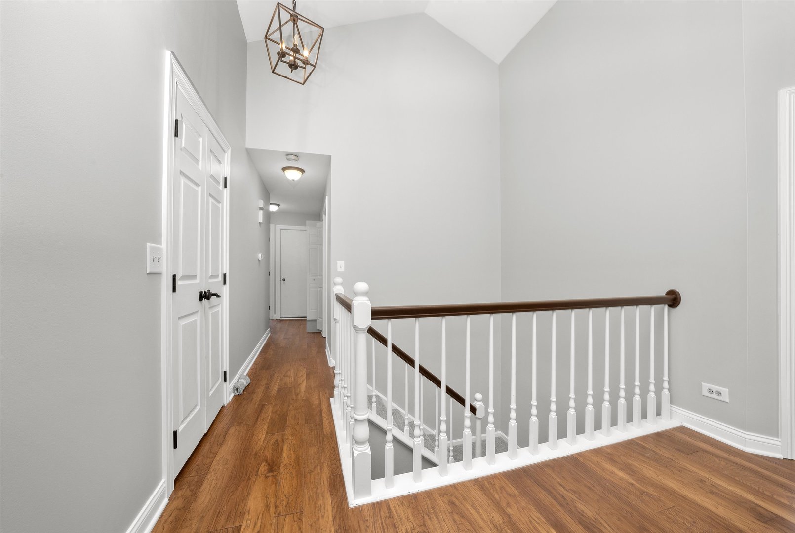 10620 Golf Road Orland Park, IL 60462 - Photo 25 of 42 a view of a hallway with wooden floor and entryway