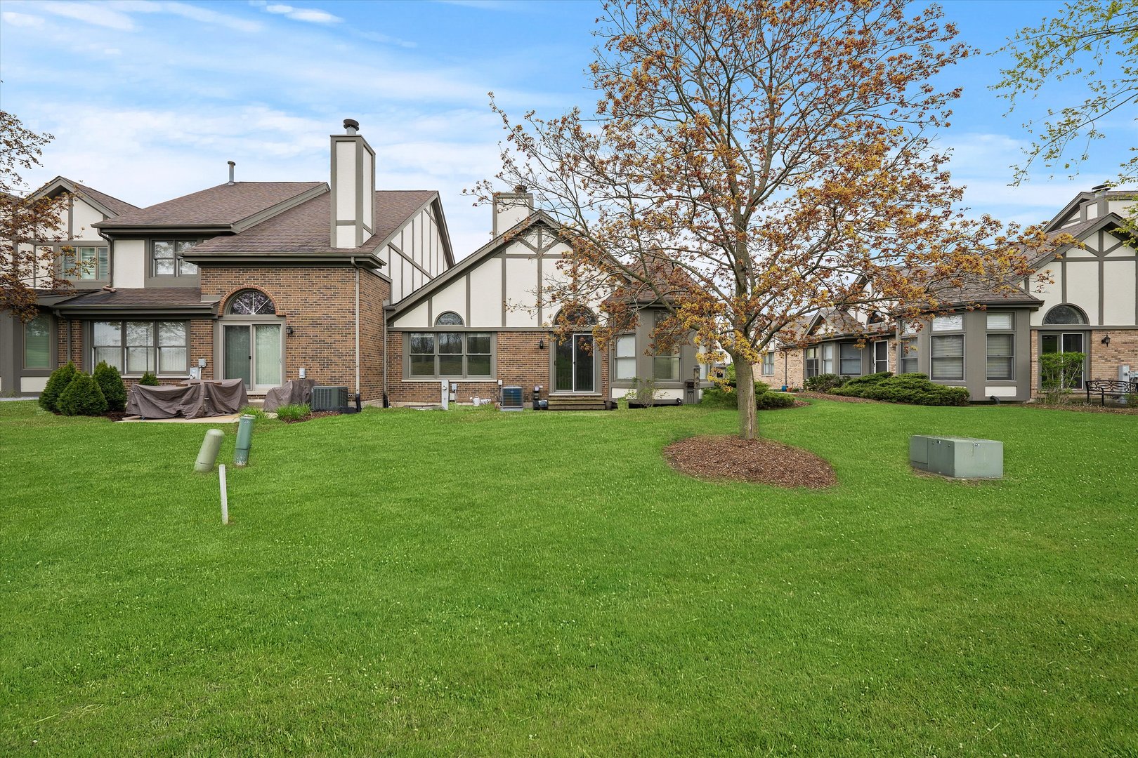 10620 Golf Road Orland Park, IL 60462 - Photo 34 of 42 a house view with a garden space