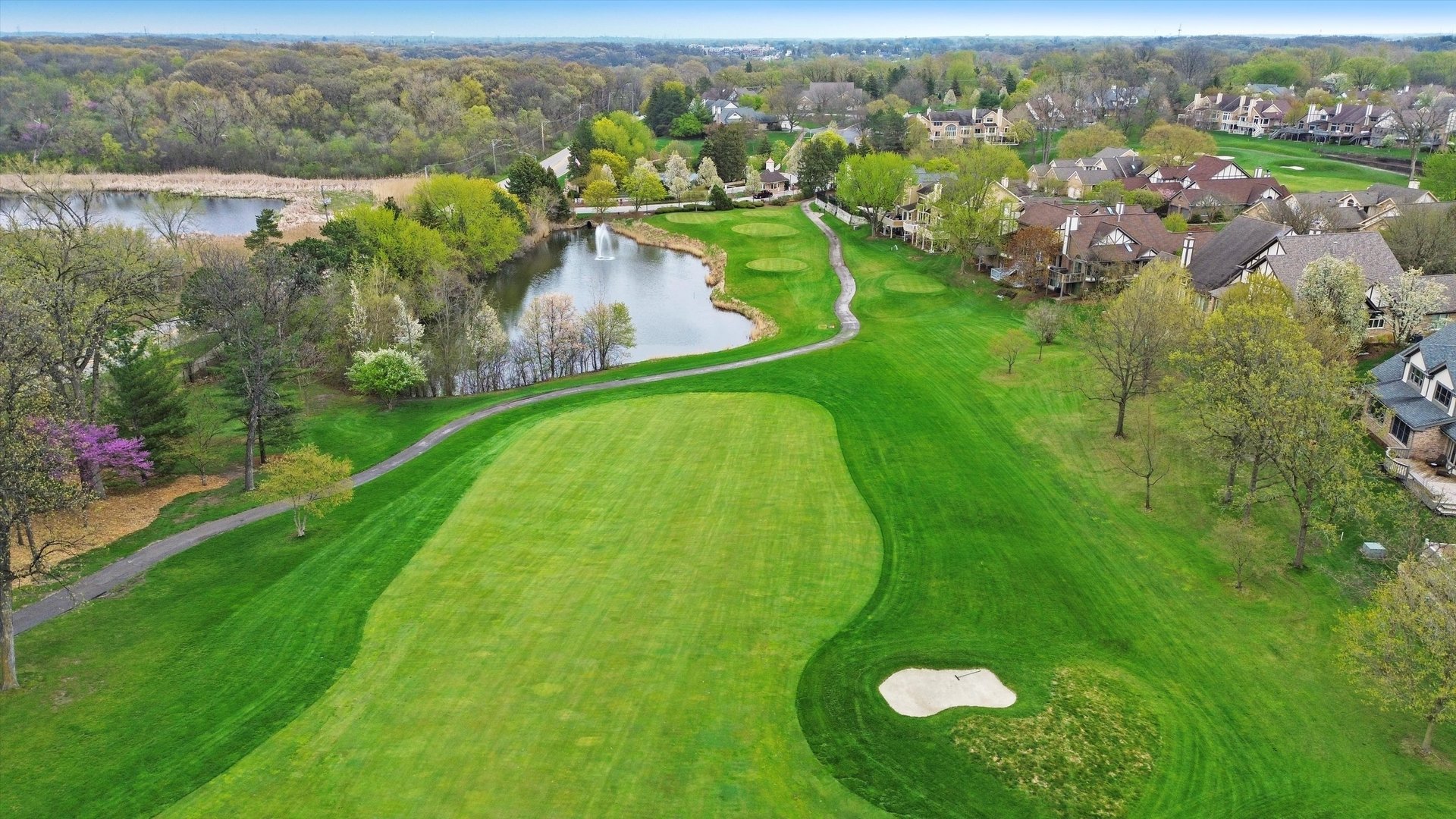 10620 Golf Road Orland Park, IL 60462 - Photo 42 of 42 an aerial view of residential houses with outdoor space and swimming pool