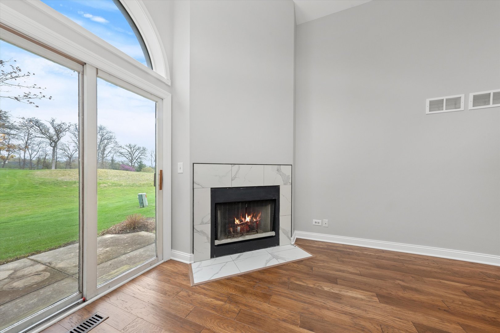 10620 Golf Road Orland Park, IL 60462 - Photo 7 of 42 a living room with a fireplace