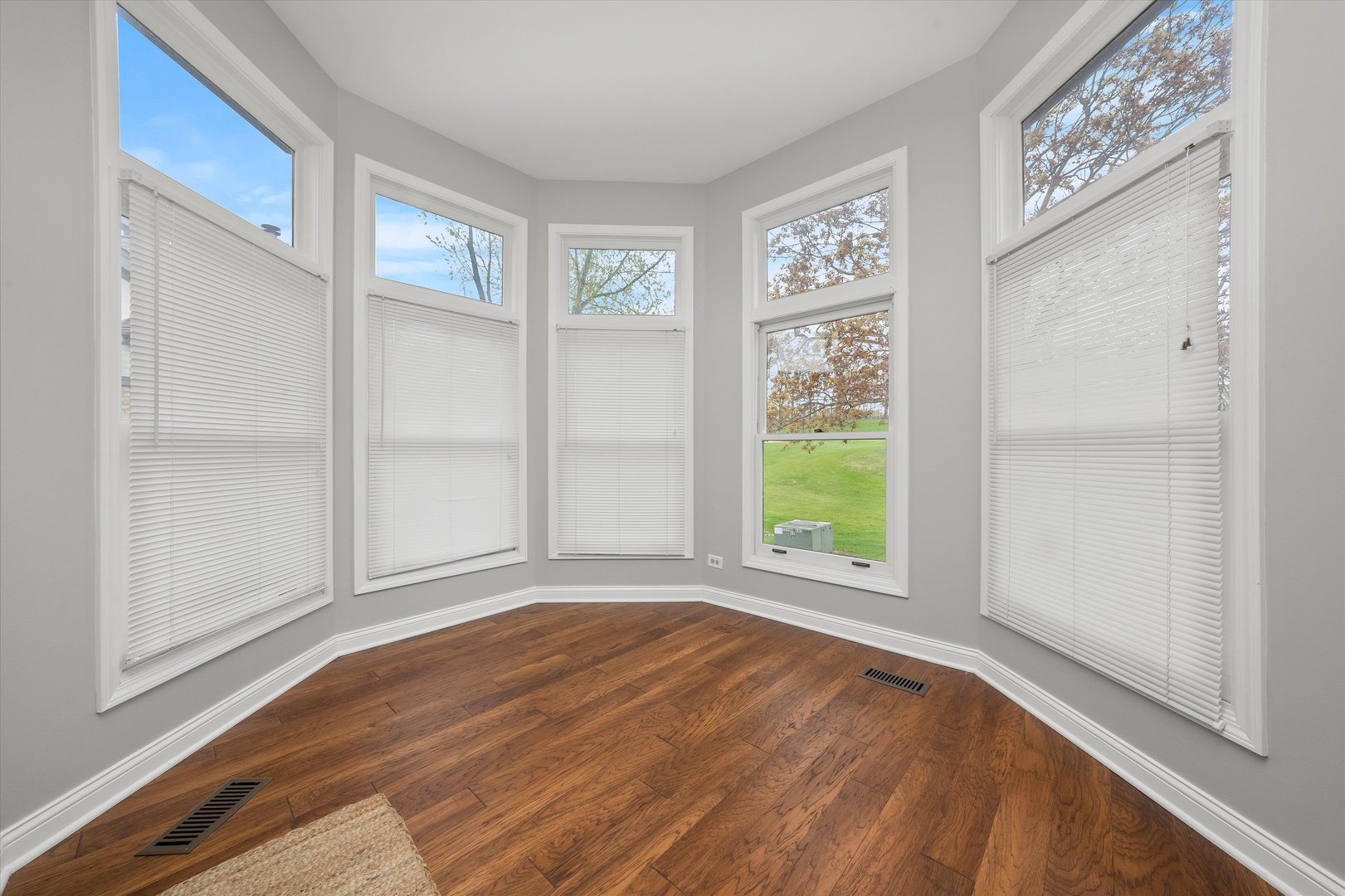 10620 Golf Road Orland Park, IL 60462 - Photo 8 of 42 a view of an empty room with a window