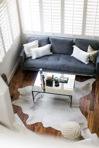 a living room with furniture and window