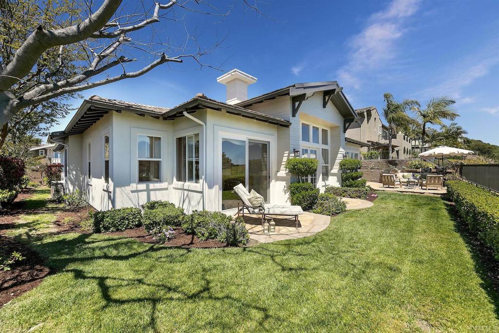 1435 Ravean Court Encinitas, CA 92024 - Photo 13 of 48 a front view of a house with garden