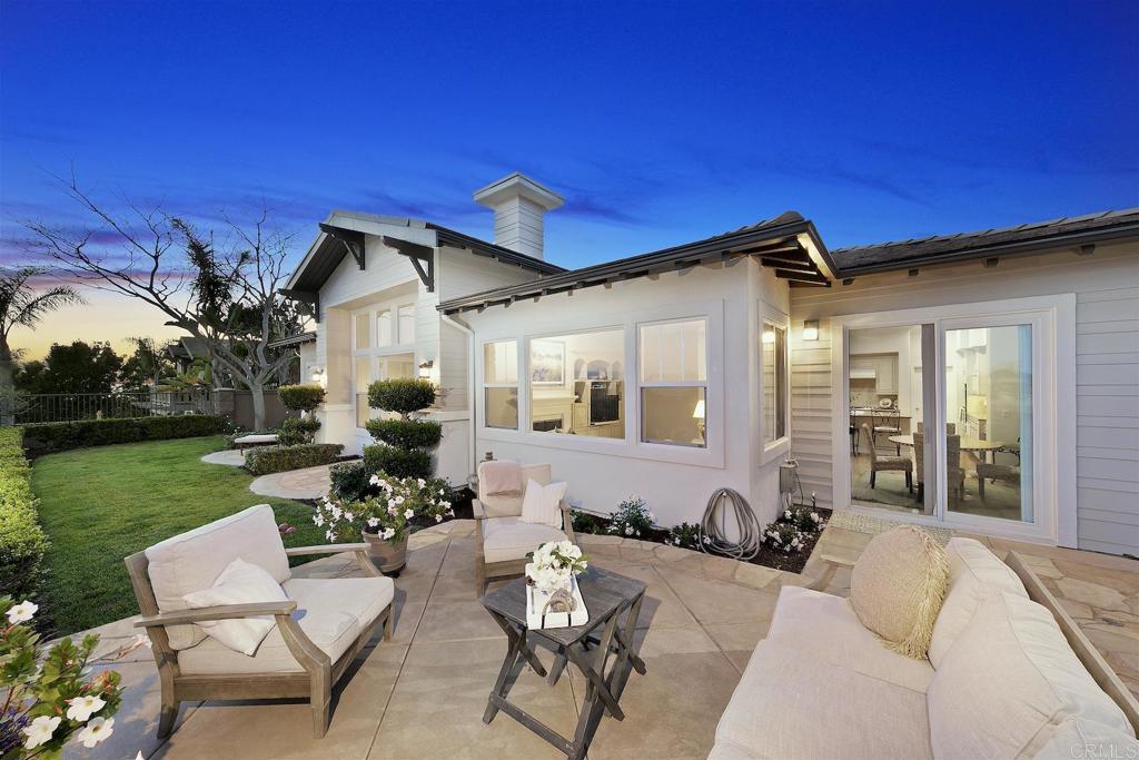 1435 Ravean Court Encinitas, CA 92024 - Photo 15 of 48 a view of a house with backyard and patio
