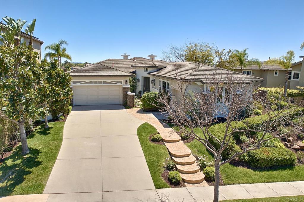 1435 Ravean Court Encinitas, CA 92024 - Photo 18 of 48 a view of a patio with plants and a garden