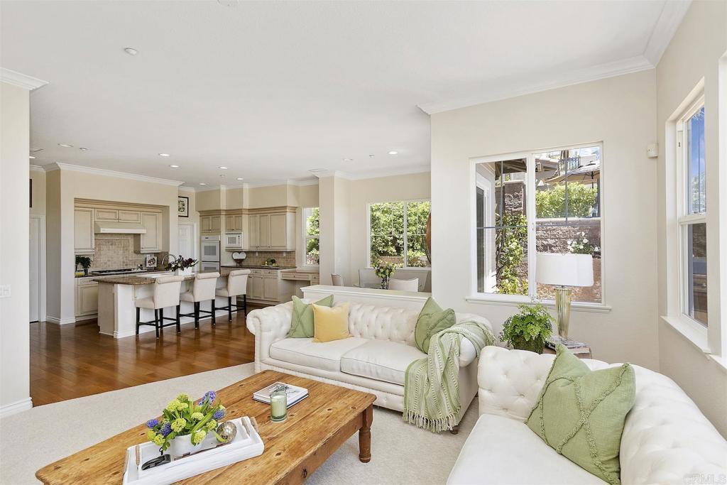 1435 Ravean Court Encinitas, CA 92024 - Photo 22 of 48 a living room with furniture and a large window
