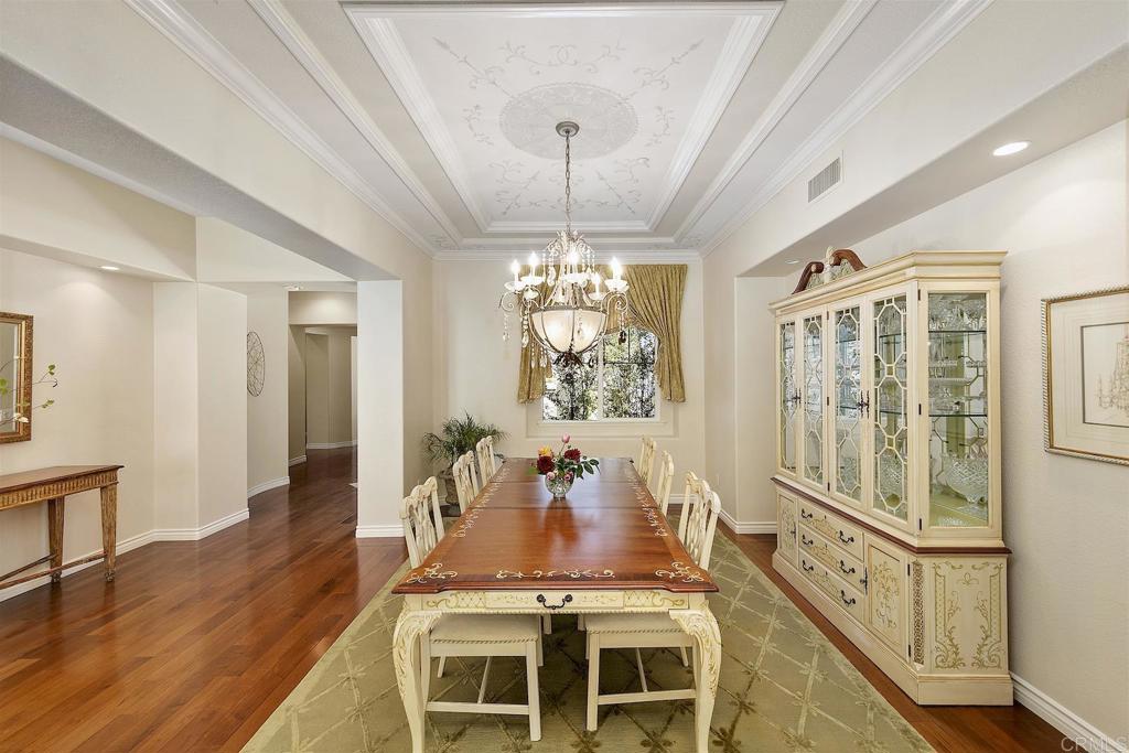 1435 Ravean Court Encinitas, CA 92024 - Photo 24 of 48 a view of a dining room with furniture window and wooden floor