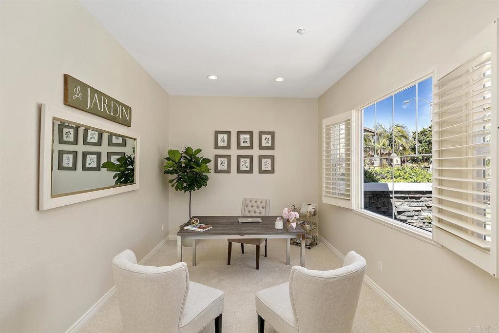 1435 Ravean Court Encinitas, CA 92024 - Photo 33 of 48 a living room with furniture and a potted plant